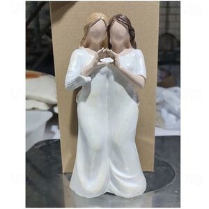Elegant White and Brown Figurine
